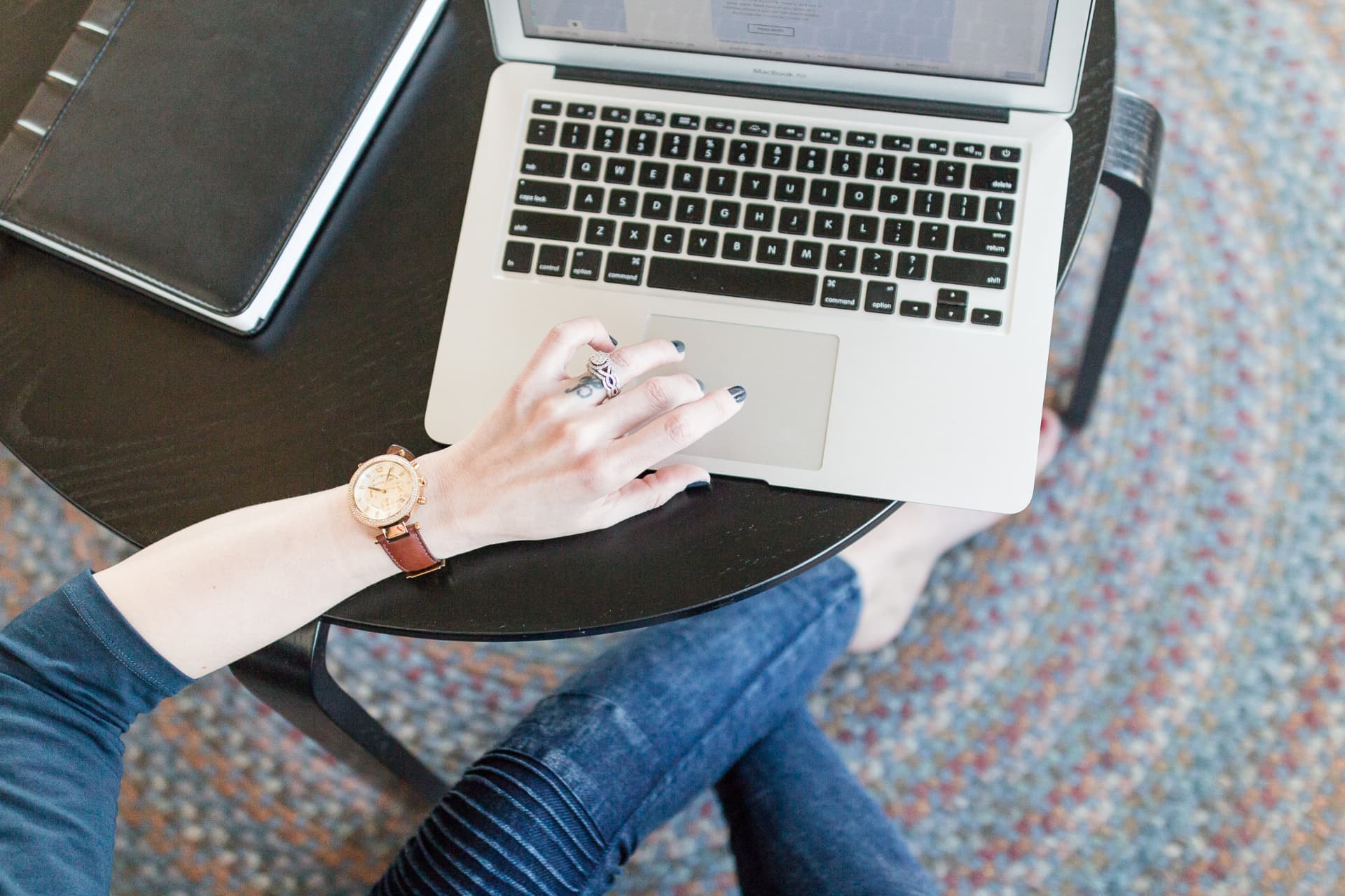 Writing website copy on a laptop